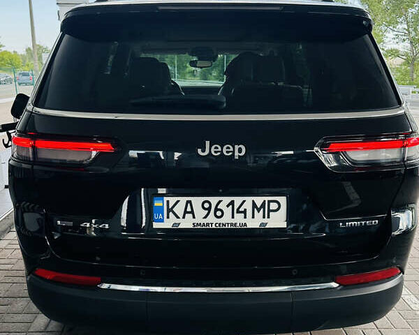 Черный Джип Гранд Чероки, объемом двигателя 5.65 л и пробегом 105 тыс. км за 43000 $, фото 3 на Automoto.ua