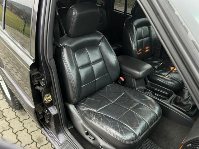 Фиолетовый Джип Гранд Чероки, объемом двигателя 2.5 л и пробегом 300 тыс. км за 5200 $, фото 22 на Automoto.ua