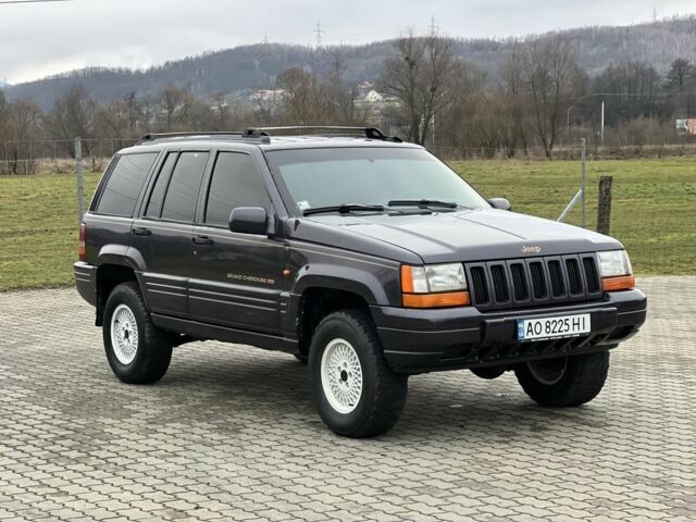 Фиолетовый Джип Гранд Чероки, объемом двигателя 2.5 л и пробегом 300 тыс. км за 5200 $, фото 10 на Automoto.ua