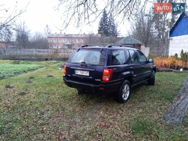 Фіолетовий Джип Grand Cherokee, об'ємом двигуна 3.12 л та пробігом 320 тис. км за 6500 $, фото 4 на Automoto.ua