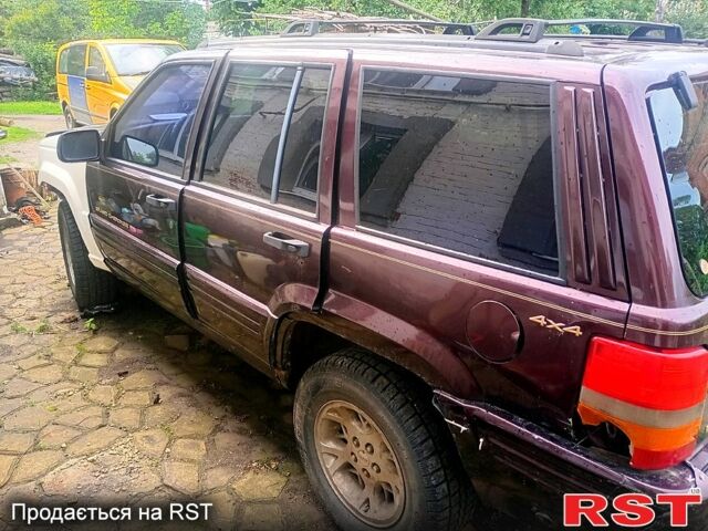 Коричневий Джип Grand Cherokee, об'ємом двигуна 5.2 л та пробігом 250 тис. км за 1500 $, фото 1 на Automoto.ua