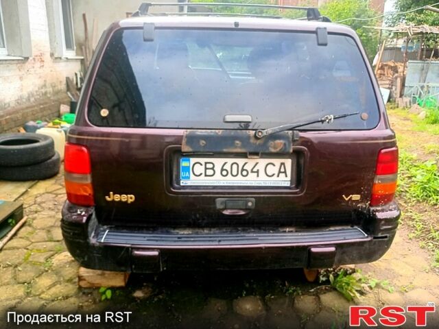 Коричневий Джип Grand Cherokee, об'ємом двигуна 5.2 л та пробігом 250 тис. км за 1500 $, фото 2 на Automoto.ua