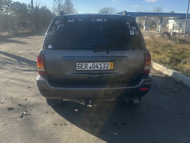 Коричневый Джип Гранд Чероки, объемом двигателя 2.7 л и пробегом 240 тыс. км за 5000 $, фото 4 на Automoto.ua