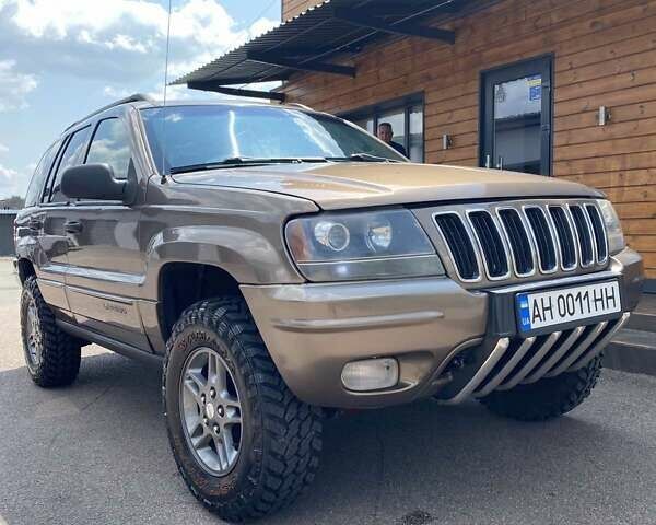 Коричневий Джип Grand Cherokee, об'ємом двигуна 3.96 л та пробігом 294 тис. км за 11250 $, фото 1 на Automoto.ua
