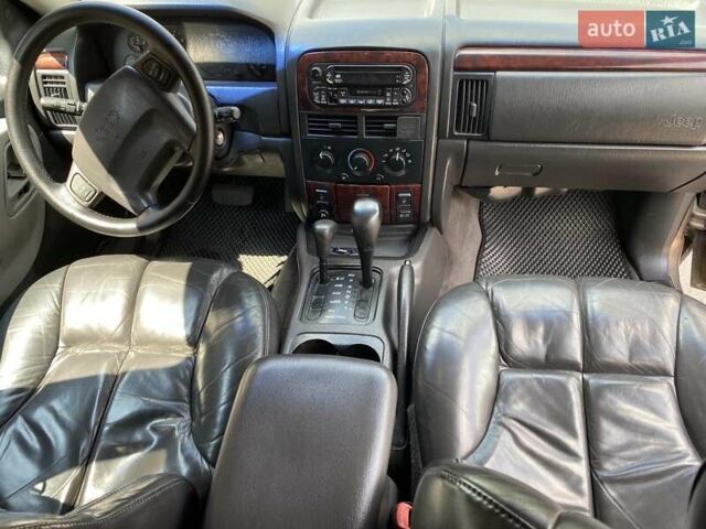 Коричневий Джип Grand Cherokee, об'ємом двигуна 3.96 л та пробігом 294 тис. км за 11250 $, фото 10 на Automoto.ua
