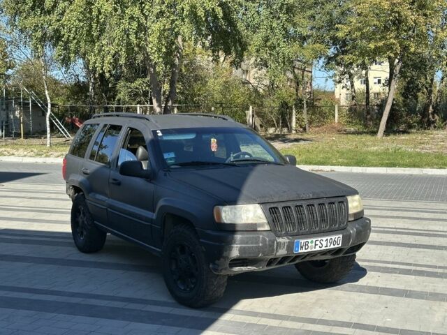 Коричневий Джип Grand Cherokee, об'ємом двигуна 4 л та пробігом 300 тис. км за 1900 $, фото 2 на Automoto.ua