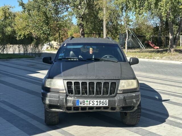 Коричневий Джип Grand Cherokee, об'ємом двигуна 4 л та пробігом 300 тис. км за 1900 $, фото 1 на Automoto.ua