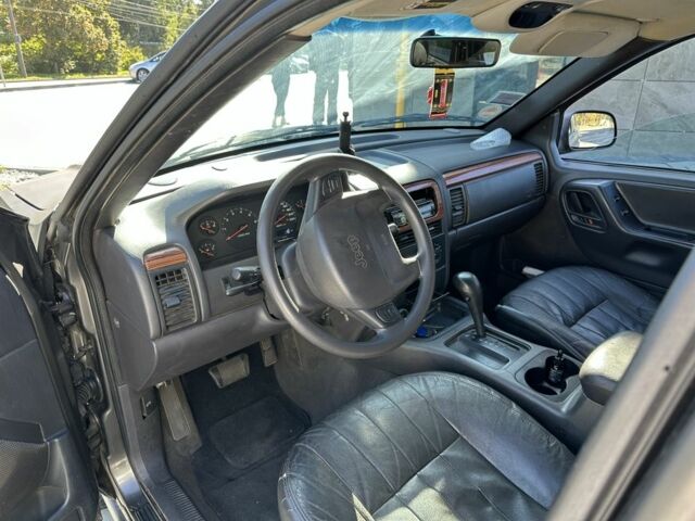 Коричневий Джип Grand Cherokee, об'ємом двигуна 4 л та пробігом 300 тис. км за 1900 $, фото 6 на Automoto.ua