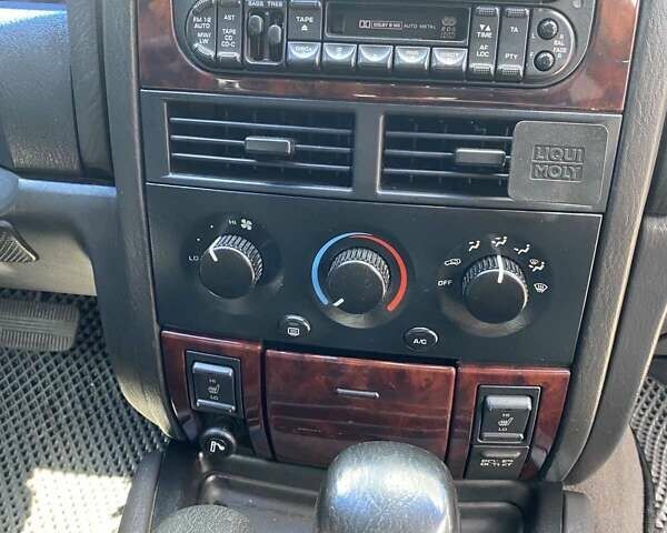 Коричневий Джип Grand Cherokee, об'ємом двигуна 3.96 л та пробігом 294 тис. км за 11250 $, фото 9 на Automoto.ua