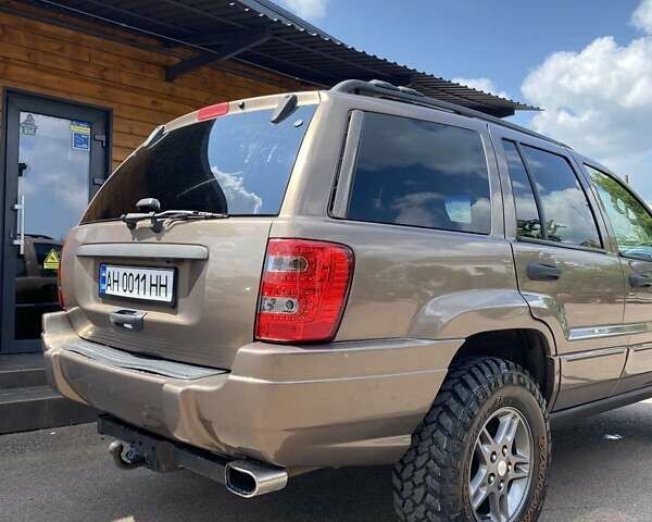Коричневий Джип Grand Cherokee, об'ємом двигуна 3.96 л та пробігом 294 тис. км за 11250 $, фото 2 на Automoto.ua