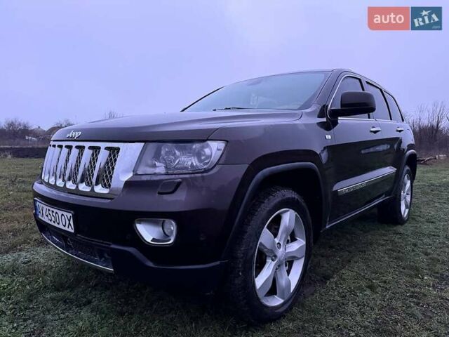 Коричневый Джип Гранд Чероки, объемом двигателя 2.99 л и пробегом 297 тыс. км за 18000 $, фото 2 на Automoto.ua