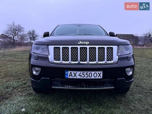 Коричневый Джип Гранд Чероки, объемом двигателя 2.99 л и пробегом 297 тыс. км за 18000 $, фото 1 на Automoto.ua