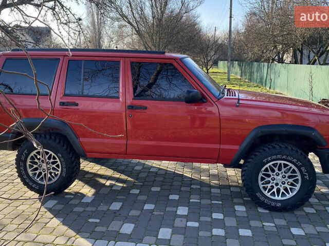 Красный Джип Гранд Чероки, объемом двигателя 4 л и пробегом 193 тыс. км за 7500 $, фото 9 на Automoto.ua