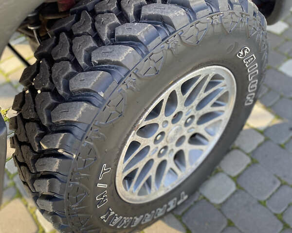 Красный Джип Гранд Чероки, объемом двигателя 4 л и пробегом 193 тыс. км за 7500 $, фото 22 на Automoto.ua