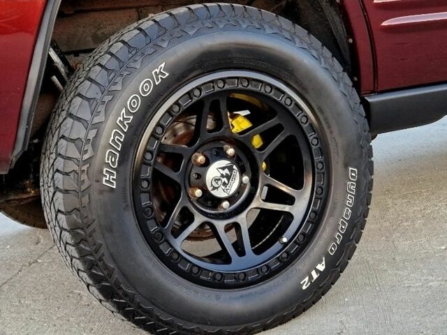 Красный Джип Гранд Чероки, объемом двигателя 3 л и пробегом 210 тыс. км за 2750 $, фото 6 на Automoto.ua