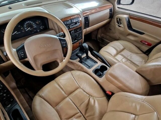 Красный Джип Гранд Чероки, объемом двигателя 3 л и пробегом 210 тыс. км за 2750 $, фото 7 на Automoto.ua