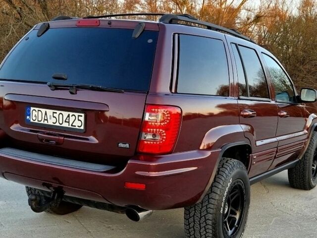 Красный Джип Гранд Чероки, объемом двигателя 3 л и пробегом 210 тыс. км за 2750 $, фото 3 на Automoto.ua