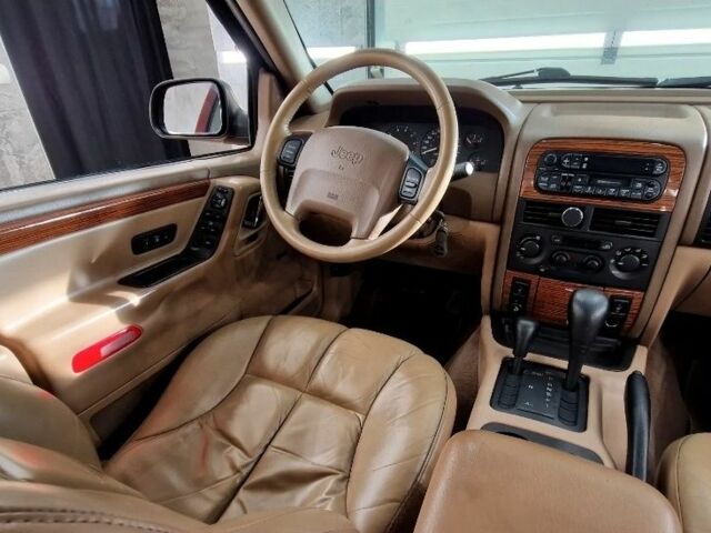 Красный Джип Гранд Чероки, объемом двигателя 3 л и пробегом 210 тыс. км за 2750 $, фото 8 на Automoto.ua