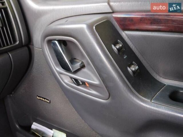 Червоний Джип Grand Cherokee, об'ємом двигуна 3.12 л та пробігом 270 тис. км за 5300 $, фото 15 на Automoto.ua