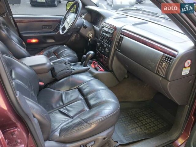 Червоний Джип Grand Cherokee, об'ємом двигуна 3.12 л та пробігом 270 тис. км за 5300 $, фото 25 на Automoto.ua