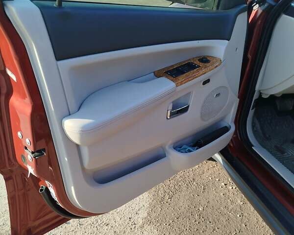 Красный Джип Гранд Чероки, объемом двигателя 2.99 л и пробегом 330 тыс. км за 11400 $, фото 10 на Automoto.ua