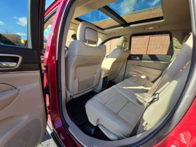 Джип Grand Cherokee 2014 у Львові на Automoto.ua Червоний Джип Grand Cherokee, об'ємом двигуна 3 л та пробігом 86 тис. км за 15600 $, фото 10 на Automoto.ua