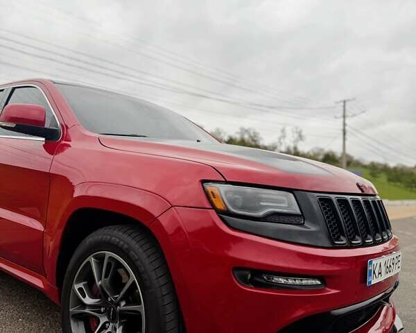 Красный Джип Гранд Чероки, объемом двигателя 6.4 л и пробегом 177 тыс. км за 31900 $, фото 12 на Automoto.ua