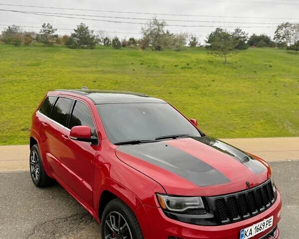 Красный Джип Гранд Чероки, объемом двигателя 6.4 л и пробегом 177 тыс. км за 31900 $, фото 5 на Automoto.ua