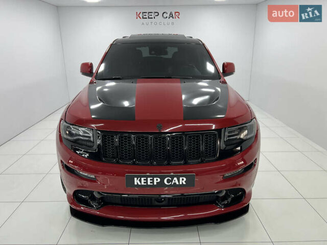 Красный Джип Гранд Чероки, объемом двигателя 6.42 л и пробегом 177 тыс. км за 33500 $, фото 2 на Automoto.ua