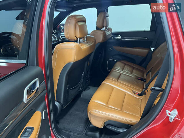 Красный Джип Гранд Чероки, объемом двигателя 6.42 л и пробегом 177 тыс. км за 33500 $, фото 28 на Automoto.ua