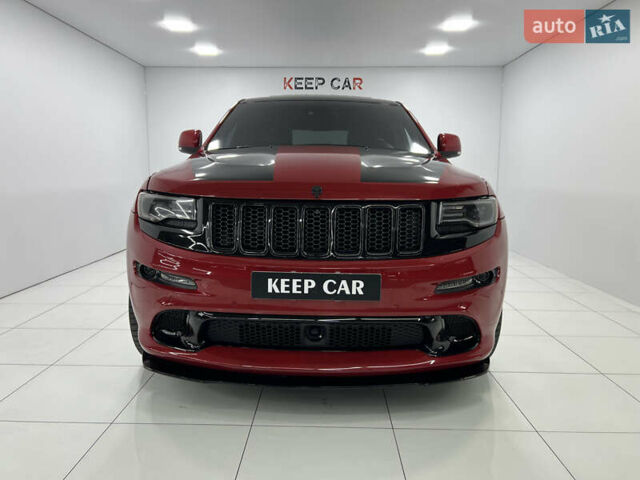 Красный Джип Гранд Чероки, объемом двигателя 6.42 л и пробегом 177 тыс. км за 33500 $, фото 3 на Automoto.ua