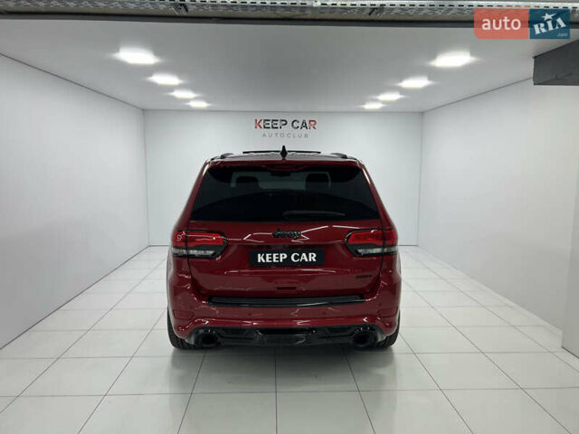 Красный Джип Гранд Чероки, объемом двигателя 6.42 л и пробегом 177 тыс. км за 33500 $, фото 10 на Automoto.ua