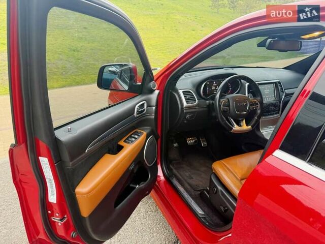 Красный Джип Гранд Чероки, объемом двигателя 6.4 л и пробегом 177 тыс. км за 31900 $, фото 16 на Automoto.ua