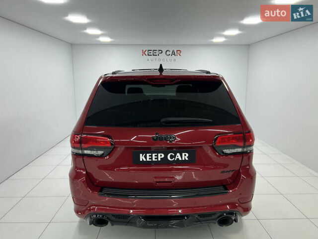 Красный Джип Гранд Чероки, объемом двигателя 6.42 л и пробегом 177 тыс. км за 33500 $, фото 11 на Automoto.ua