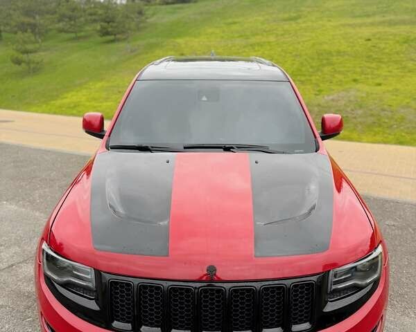 Красный Джип Гранд Чероки, объемом двигателя 6.4 л и пробегом 177 тыс. км за 31900 $, фото 3 на Automoto.ua