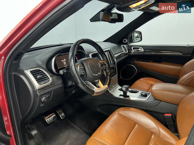 Красный Джип Гранд Чероки, объемом двигателя 6.42 л и пробегом 177 тыс. км за 33500 $, фото 20 на Automoto.ua
