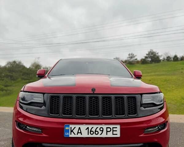 Красный Джип Гранд Чероки, объемом двигателя 6.4 л и пробегом 177 тыс. км за 31900 $, фото 4 на Automoto.ua