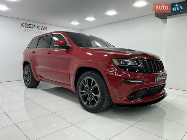 Красный Джип Гранд Чероки, объемом двигателя 6.42 л и пробегом 177 тыс. км за 33500 $, фото 5 на Automoto.ua