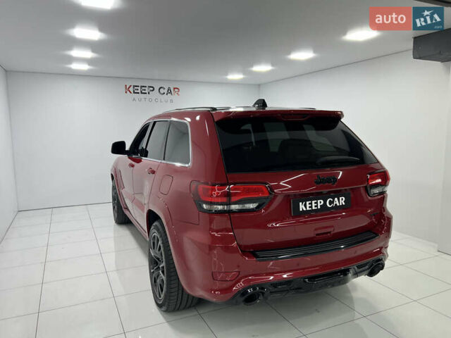 Красный Джип Гранд Чероки, объемом двигателя 6.42 л и пробегом 177 тыс. км за 33500 $, фото 13 на Automoto.ua