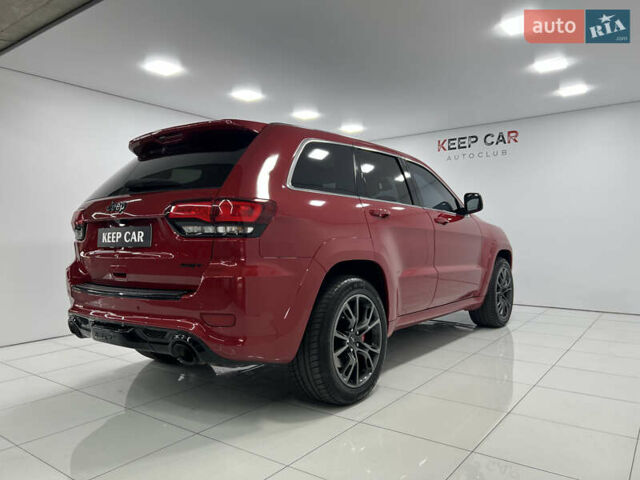 Красный Джип Гранд Чероки, объемом двигателя 6.42 л и пробегом 177 тыс. км за 33500 $, фото 18 на Automoto.ua