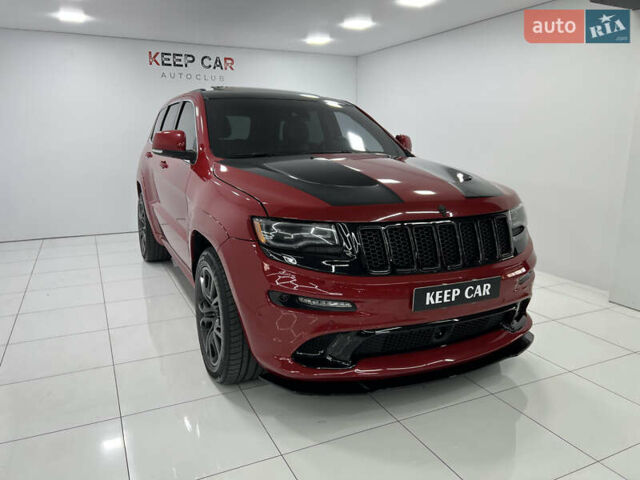 Красный Джип Гранд Чероки, объемом двигателя 6.42 л и пробегом 177 тыс. км за 33500 $, фото 4 на Automoto.ua