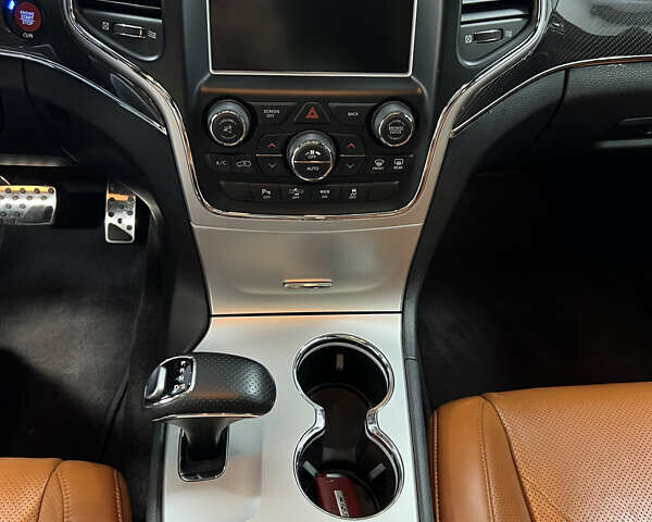 Красный Джип Гранд Чероки, объемом двигателя 6.42 л и пробегом 177 тыс. км за 33500 $, фото 24 на Automoto.ua