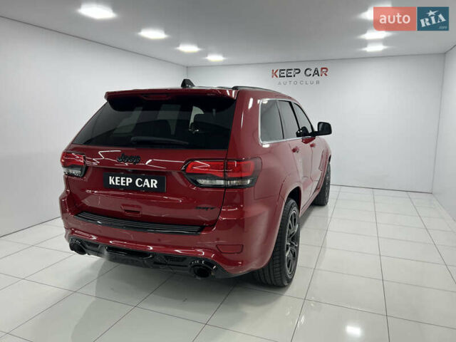 Красный Джип Гранд Чероки, объемом двигателя 6.42 л и пробегом 177 тыс. км за 33500 $, фото 16 на Automoto.ua