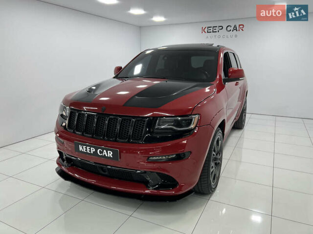 Красный Джип Гранд Чероки, объемом двигателя 6.42 л и пробегом 177 тыс. км за 33500 $, фото 6 на Automoto.ua