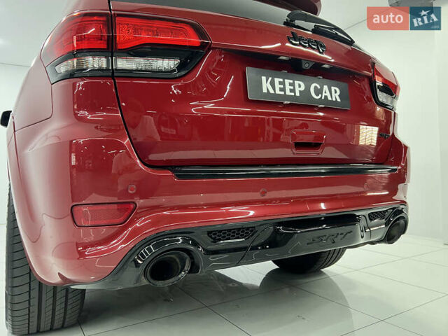 Красный Джип Гранд Чероки, объемом двигателя 6.42 л и пробегом 177 тыс. км за 33500 $, фото 19 на Automoto.ua