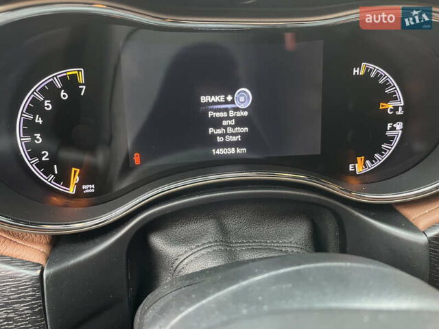 Червоний Джип Grand Cherokee, об'ємом двигуна 3.6 л та пробігом 145 тис. км за 29800 $, фото 10 на Automoto.ua