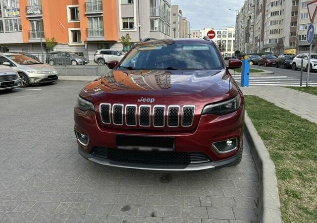 Красный Джип Гранд Чероки, объемом двигателя 2.4 л и пробегом 99 тыс. км за 19800 $, фото 1 на Automoto.ua