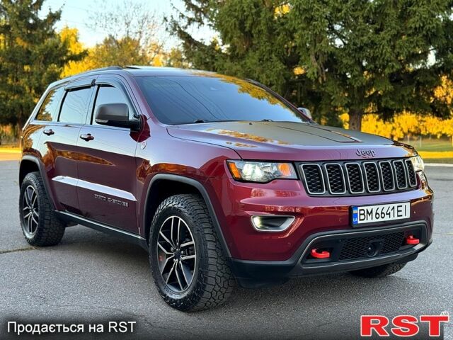 Червоний Джип Grand Cherokee, об'ємом двигуна 5.7 л та пробігом 99 тис. км за 35000 $, фото 1 на Automoto.ua