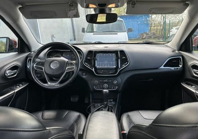 Красный Джип Гранд Чероки, объемом двигателя 2.4 л и пробегом 99 тыс. км за 19800 $, фото 8 на Automoto.ua