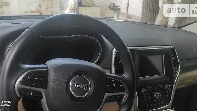 Красный Джип Гранд Чероки, объемом двигателя 3.6 л и пробегом 50 тыс. км за 22000 $, фото 7 на Automoto.ua